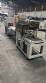 Automatic L-sealer with shrink tunnel.
