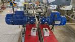 Automatic double head labeling machine for flat bottles Bauch Campos