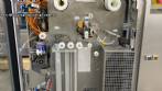 Tetra Pak A3 aseptic filling machine with cardboard packer 70 and tray shrink 51.