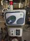 Automatic self-adhesive labeling machine for cylindrical bottles