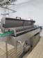 Can filling and seaming machine with washer, rinser, and sterilizer - Metal�rgica Mococa