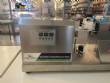 Cetro benchtop ultrasonic tube and pipe filling and dosing machine.