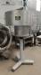 Complete filling line with Tecman Nelpas Tecnoenvase Tudela bottle filling, labeling, capping, and positioning machines for cosmetic liquids.