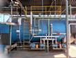 Wood-fired flame tube boiler for steam generation