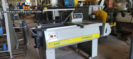 L-shaped sealer with shrink tunnel for packaging packages Smipack