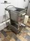 Stainless steel meat grinder with size 98 opening.
