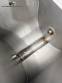Stainless steel meat grinder with size 98 opening.