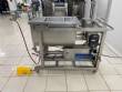 Unifiller stainless steel dosing pump with homogenizing mixer for bakery foods.