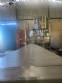 Gravimetric rotary filling machine in stainless steel with cabin