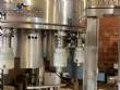 Gravimetric rotary filling machine in stainless steel with cabin