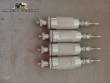 Erli rotary liquid filling machine with 4 pistons, 14,400 units per hour.