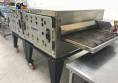 Industrial tunnel oven for cooking food