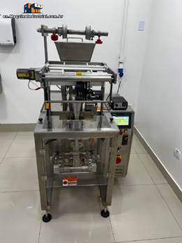 Automatic volumetric dosing packaging machine for powder products.