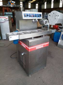 Tempering machine with cover plate coupled to Sidmaq