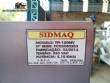 Tempering machine with cover plate coupled to Sidmaq