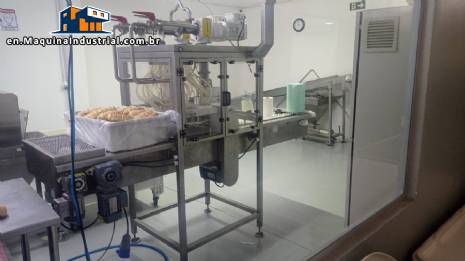 Stuffing machine for garlic bread