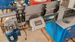 Automatic double-head labeling machine for cylindrical and flat bottles, Tudela, 3,000 labels per hour.