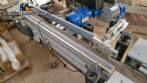 Automatic double-head labeling machine for cylindrical and flat bottles, Tudela, 3,000 labels per hour.