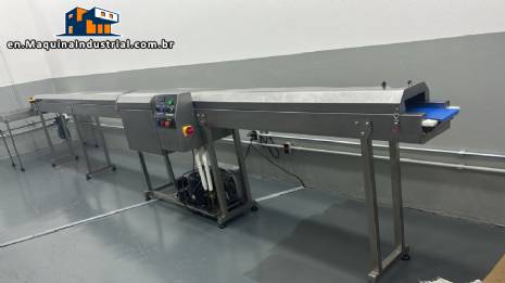 Chocolate coating machine with cooling tunnel for AGUIATECH coatings.