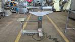 Semi-automatic stainless steel liquid filling machine with 1 nozzle.