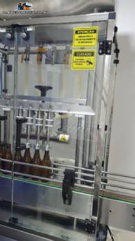 Linear filling machine with 4 stainless steel nozzles