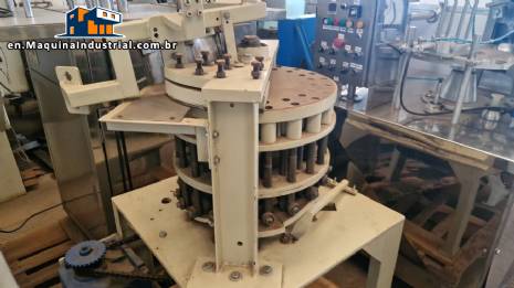Rotary press for peanut brittle with double track, producing up to 200 peanut brittle candies per minute.