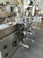 Labeling machine for dropper bottles with double printhead transparent stainless steel label