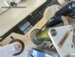 Labeling machine for dropper bottles with double printhead transparent stainless steel label