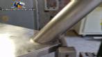 Inclined screw conveyor with stainless steel silo