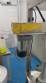 Rotmaq screw capping machine with cap positioning elevator