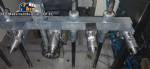 Linear filling machine with 6 pistons filling system