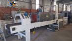 Labeling machine with steam sleeve tunnel and bottle baler