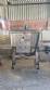 Labeling machine with steam sleeve tunnel and bottle baler