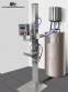 Liquid and viscous products packaging machine