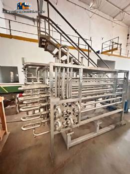 FAMONTE stainless steel spiral tubular pasteurizer, 3,500 liters per hour, for fruit pulp, juices, dairy products, and dairy products. FAMONTE stainless steel spiral tubular pasteurizer, 3,500 liters per hour, for fruit pulp, juices, dairy products, and dairy products.