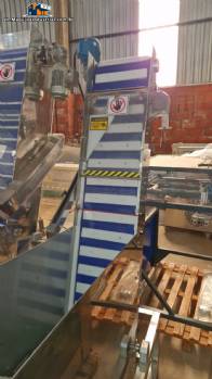 TecnoEnvase TAG 5000 stainless steel vibratory cap feeder and orienter TecnoEnvase TAG 5000 stainless steel vibratory cap feeder and orienter
